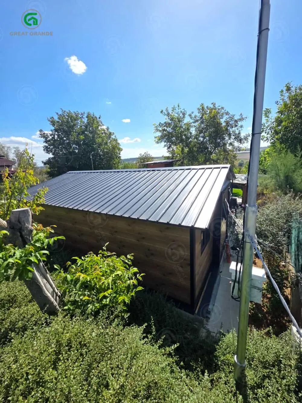 A hillside home in Bulgaria on a 20 ft wing-expandable unit — site photo 1